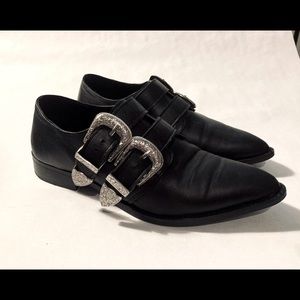 Black oxfords with stylish silver buckles
